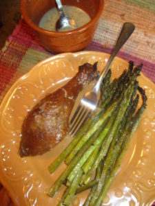 Roasted garlic marinade on asparagus