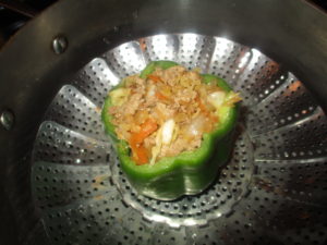 A bell pepper stuffed with Egg Roll in a Bowl. 