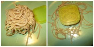 spaghetti noodles in yellow container