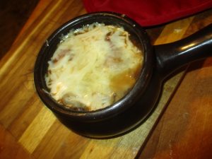 French onion soup topped with melted cheese