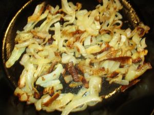 skillet of golden baked caramelized onions