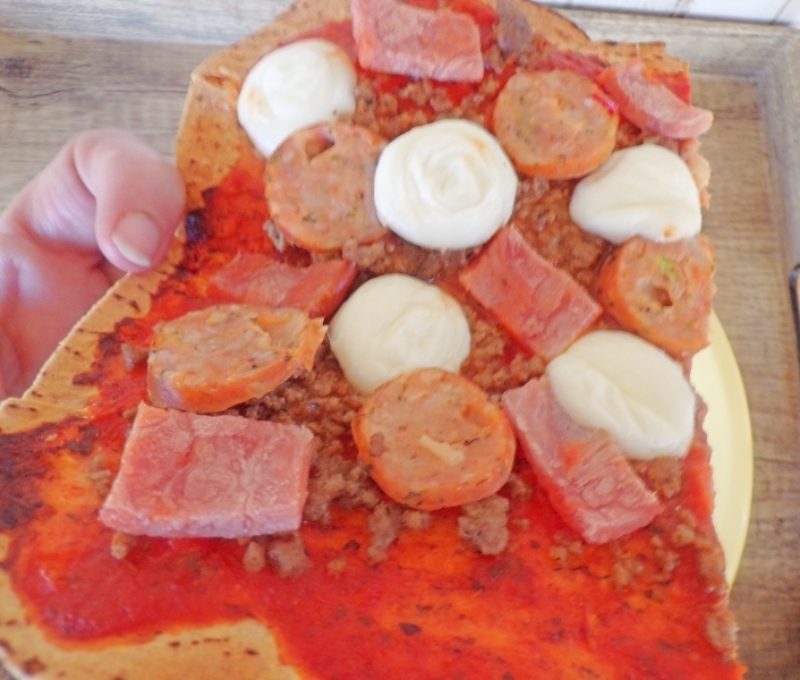triple meat pizza